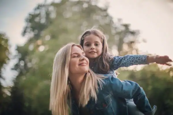 happy mum and daughter following mediation to resolve parental alienation Gloucestershire